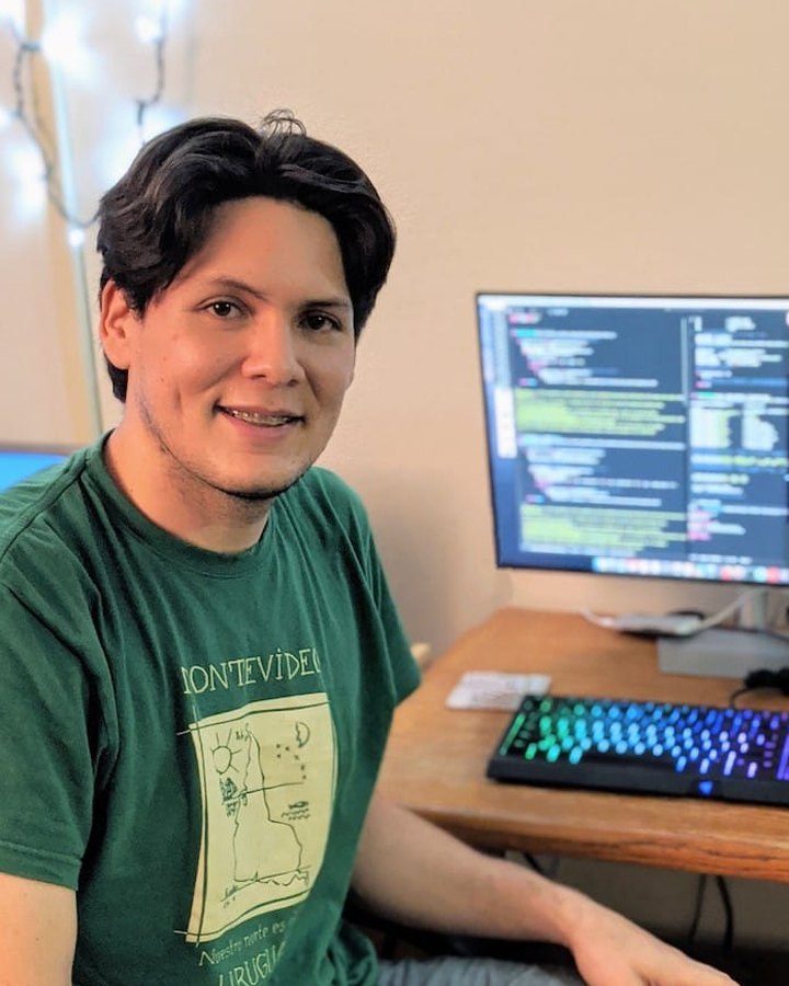 Héctor A. Inda Díaz at his workstation with atmospheric data on screen